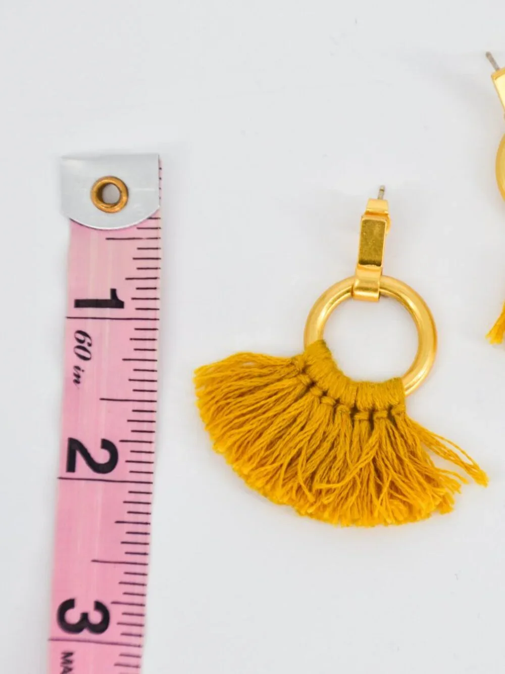 Madewell tassel statement